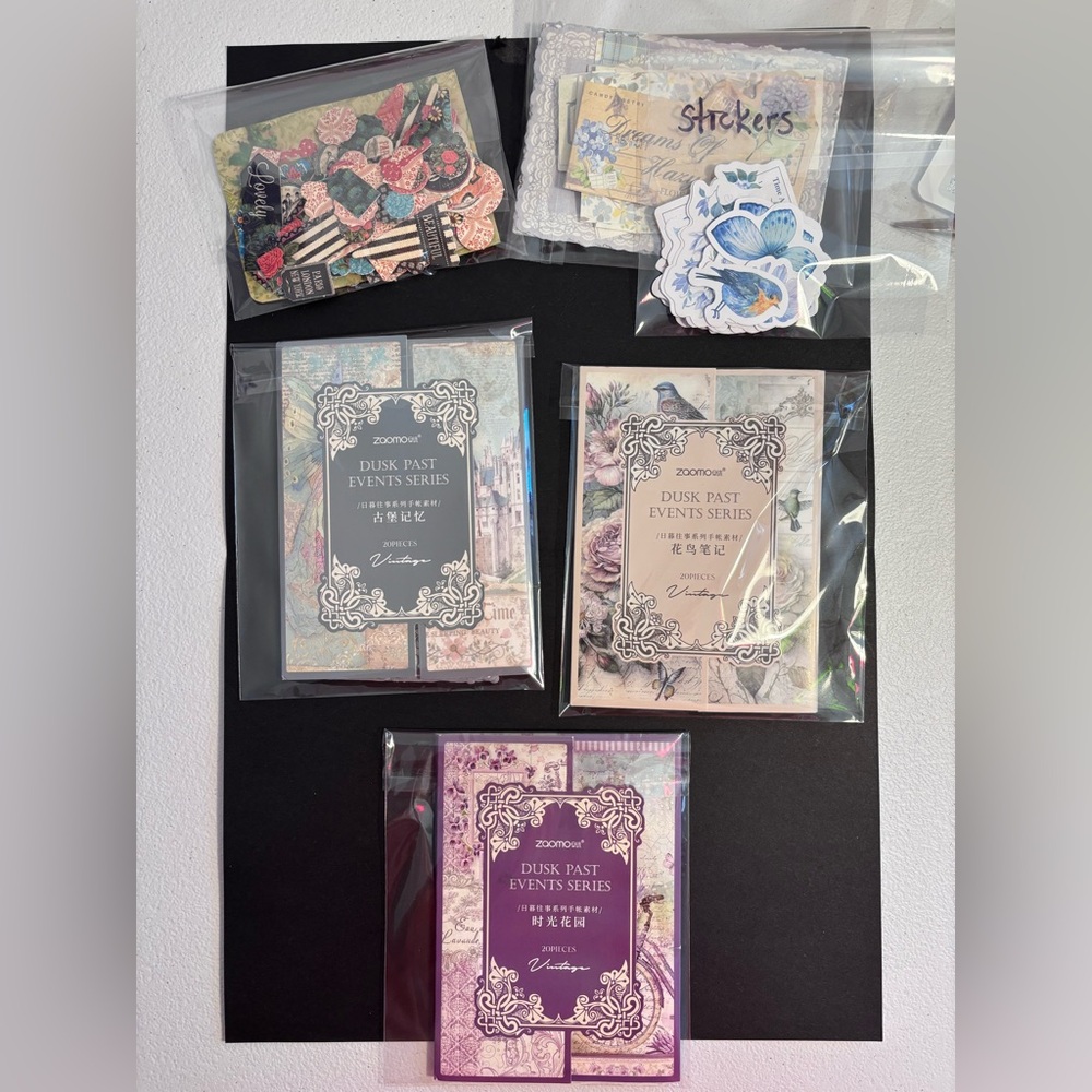 Scrapbook, junk journal, card making and craft paper and stickers.